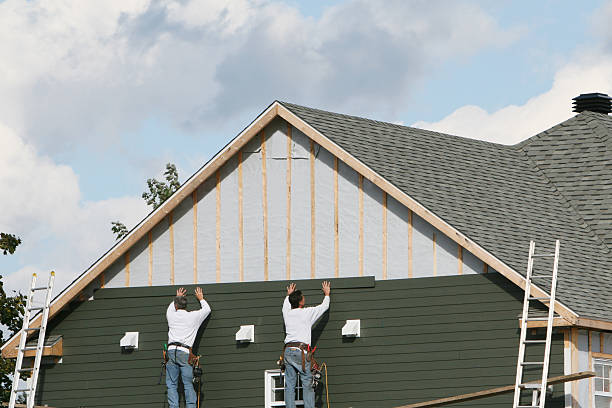 Professional Siding Installation technician working in Morristown, OH
